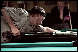 Andy playing pool - OTC Billiards